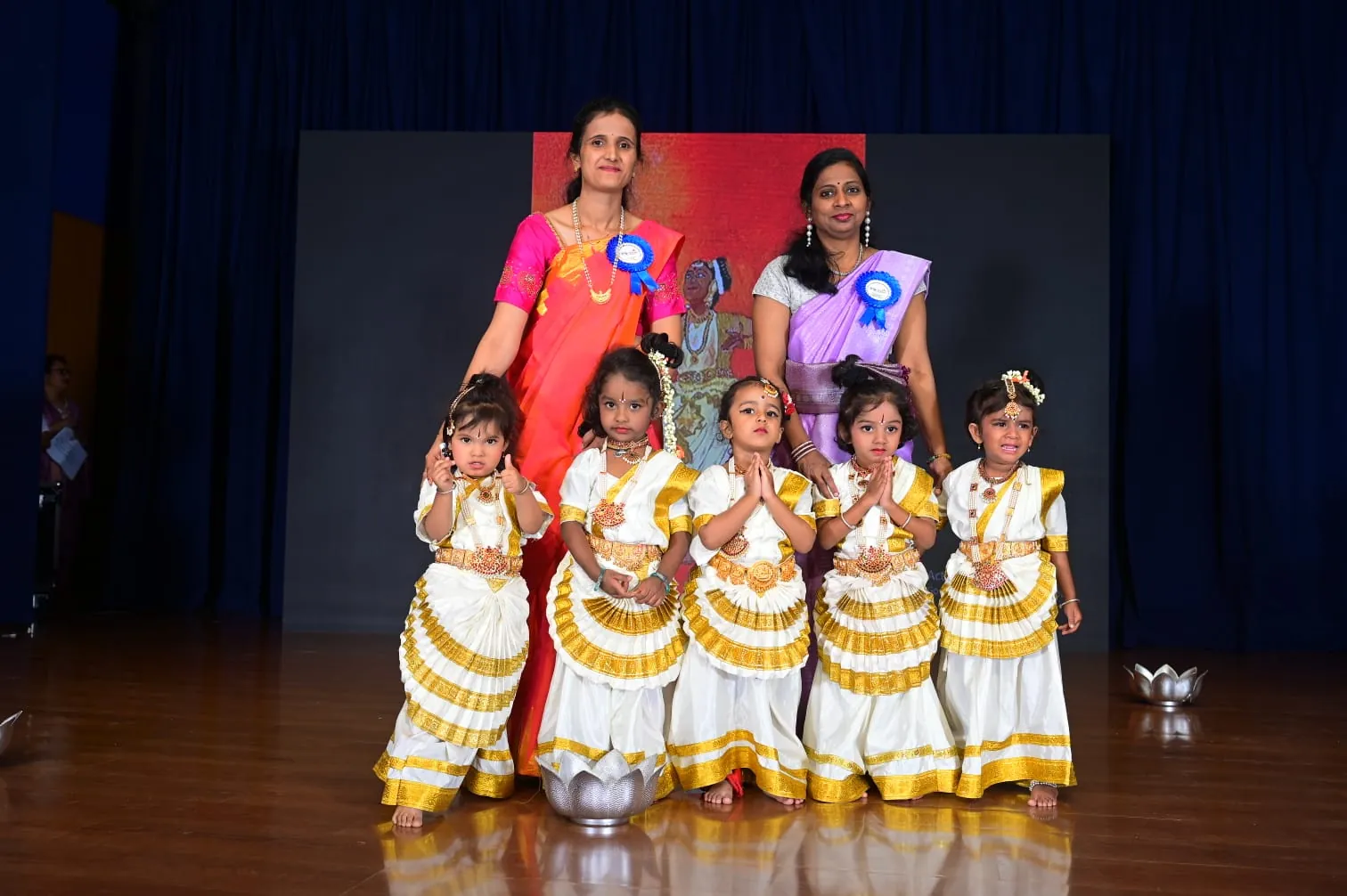 Children performing on stage during annual day